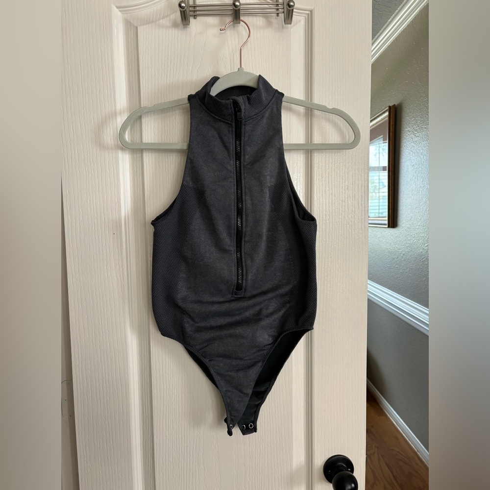Fabletics bodysuit. And likeβ new condition not sure of size pit to pit 0806